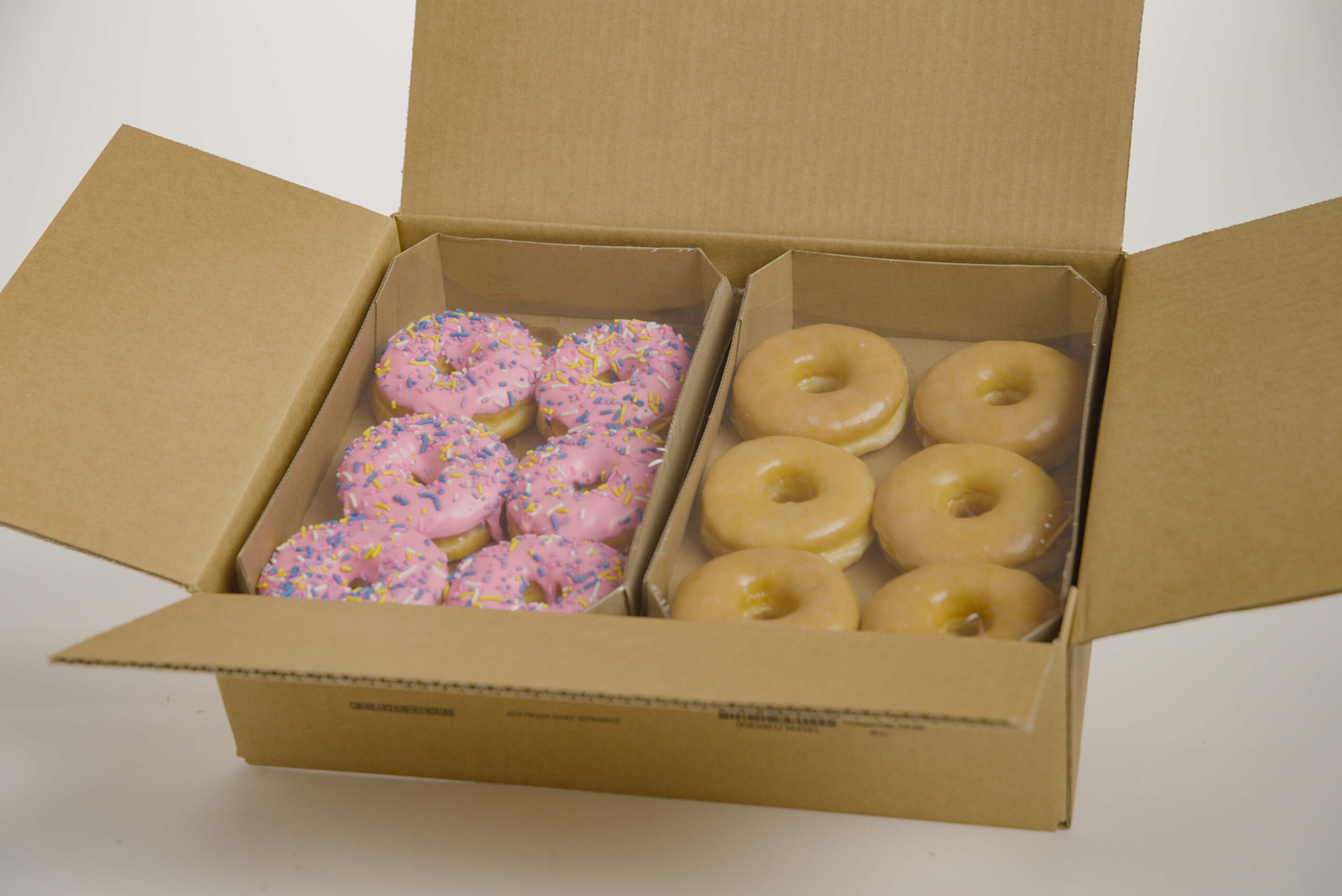 Talerico Bakery Assorted Box A - Case of Glazed Rings, Pink Iced Rings, Boston Crème Bismarks, and Apple Fritters